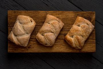 hot pastry, apple strudel, on a wooden board, new year and christmas, traditions