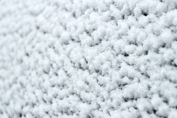 Fototapeta premium texture of snow on glass in heavy snow, close-up