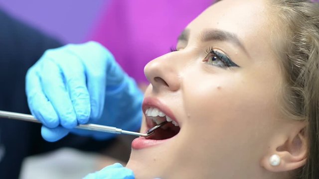 Woman Getting Dental Consultation