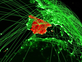 Spain from space on model of green planet Earth with network. Concept of green technology, connectivity and travel.