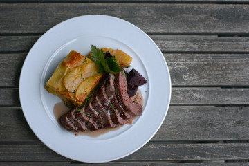 Pork steak with gratinated potatoes