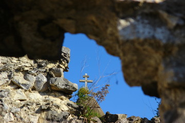 monuments of faith cross on a rock in Abkhazia
