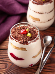 Layered yogurt with biscuit and berries