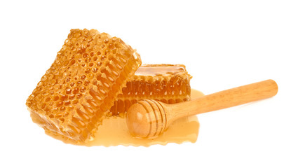 Yellow Honeycomb slice closeup isolated on white background
