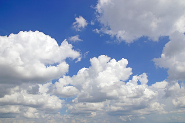 blue sky background with tiny clouds