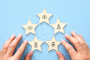 setting a five star medical service goal.  healthcare and insurance concept
