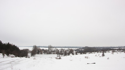 Fototapeta na wymiar Winter landscape with snow covered countryside.Snow-covered rural fields