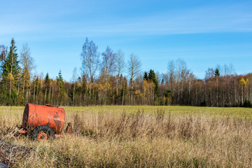 Fototapeta premium empty countryside landscape in autumn with fields and meadows and rare trees in background