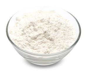 Fototapeta na wymiar bowl of wheat flour isolated on white