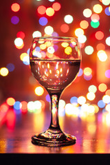  wine glass on the background of lights lights