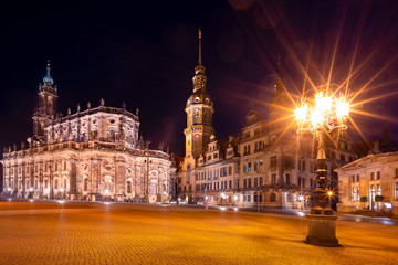 Fototapeta na wymiar View of the Dresden Castle (German: Residenzschloß), the Dresden Cathedral (German: Katholische Hofkirche) and the Theater Square (German: Theaterplatz) in Dresden, Germany. Illumination at night.