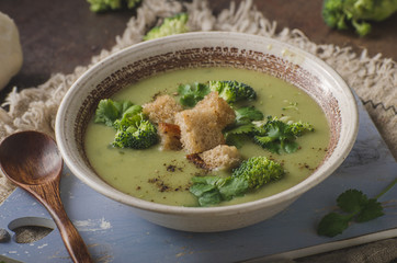 Homemade broccoli soup, fresh vegetable in and crispy croutons