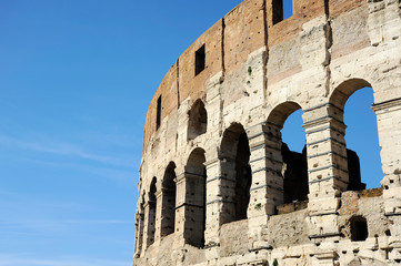 Fototapeta premium A section of the facade of the Colosseum (Flavian Amphitheatre) in Rome, Lazio, Italy