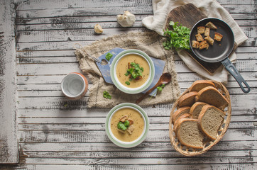 Creamy mushroom soup with fresh herbs garlic croutons