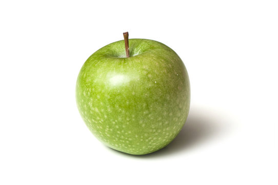 Closeup of green apple on white background