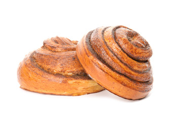 Freshly baked cinnamon rolls on white background
