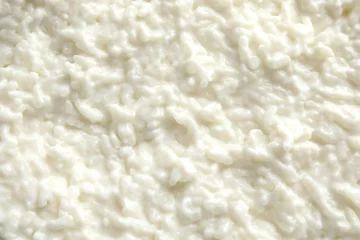 Fotobehang Delicious creamy rice pudding as background, top view © New Africa