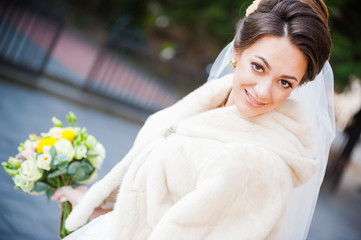 Portrait of beautiful european bride in autumn