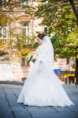 Obraz premium Portrait of beautiful european bride in autumn