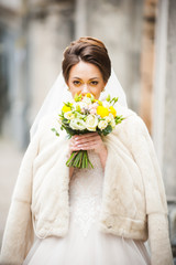 Portrait of beautiful european bride in autumn