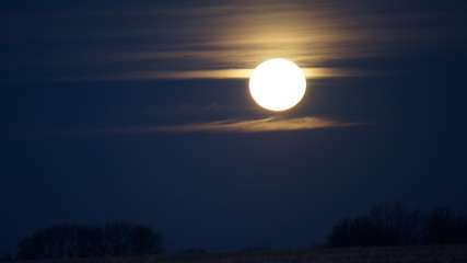 Full Moon Setting on the Morning of the Winter Solstice  (Cold moon)