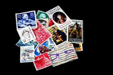 USA Postage Stamp Collection on Black Background