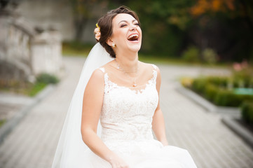 Beautiful european smiling bride in wedding dress