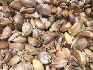 close up garlic cloves on market for cooking