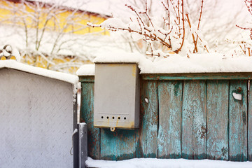 Mailbox on the fence. Winter