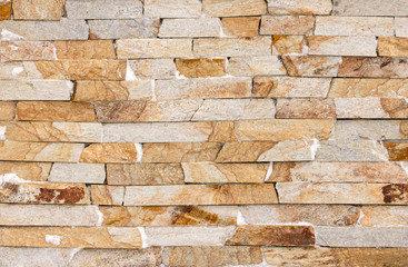 Fototapeta premium Orange facing stone, slate, sandstone and travertine marble texture