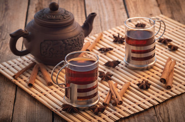 black tea, glass glasses, wooden table