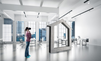 Girl in virtual reality mask experiencing virtual technology wor