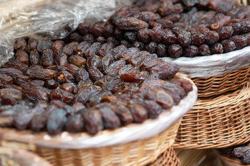 Two baskets with dried figs closeup. Selective focus.