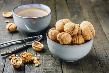 Walnuts in a blue bowl.