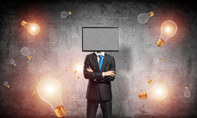 Businessman with TV instead of head.