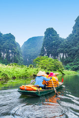Trang An rowboat with beautiful mountains view, Ninh Binh, Vietnam - obrazy, fototapety, plakaty