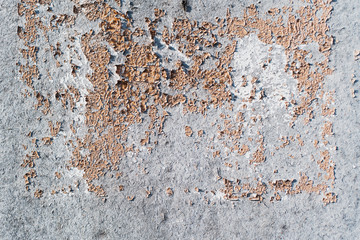 Peeling paint on a concrete stone slab.Texture