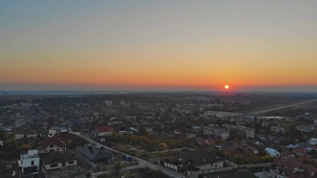 Aerial view of middle class houses in small village or town in the countryside. Top view above houses at sunrise above in the autumn Uzhhorod Ukraine Europe