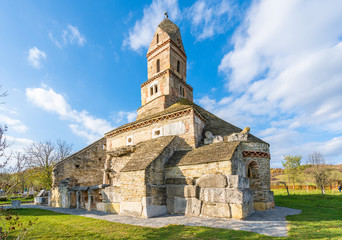 Fototapeta na wymiar Densus Christian Church, Dacian and Roman temple in Densus village, Hunedoara, Hateg, Romania