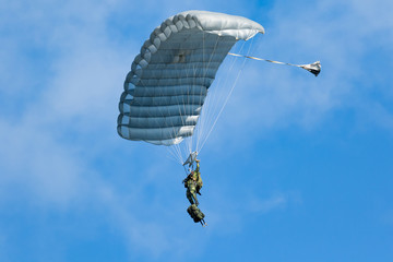 paratrooper against blue sky
