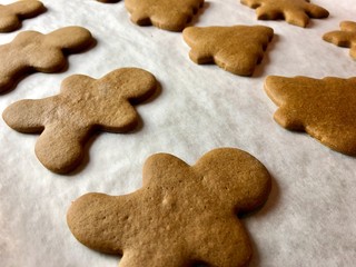 Gingerbread cookies on parchment paper