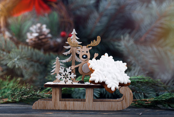 Delicious and fragrant gift in the form of snowflakes on a rustic table and with a festive decor.