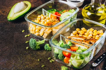  Healthy meal prep containers chicken and fresh vegetables. © juliamikhaylova