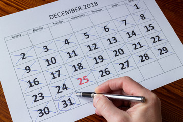 Marking days in december, end of the year concept