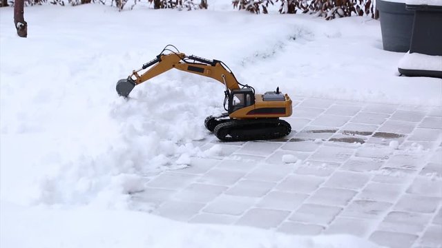 Short film of working radio controlled model excavator car. Free time. Children and adults concept. Hobby. Toys. 