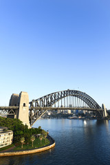 Sydney Harbour Bridge as viewed from a high vantage point at dawn.
