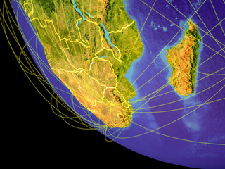 Southern Africa from space with visible country borders and global connections representing communication or air travel.