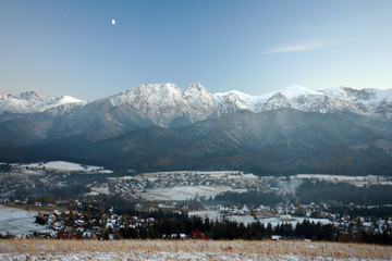 view from Koscielisko village to the Zakopane city, Giewont Mountain and Tatra Mountains, Poland