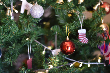 Closeup of Christmas-tree blurred background. Christmas decorations