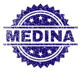 MEDINA stamp seal watermark with distress style. Blue vector rubber print of MEDINA text with unclean texture.